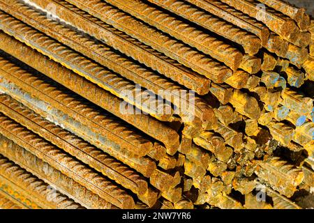 Light rusted bundle of reinforcement steel rods stored at a construction site Stock Photo