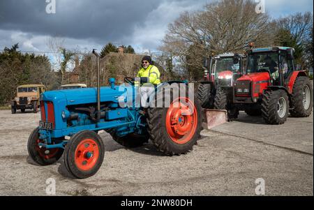 A man drives a vintage Fordson Power Major tractor at a vintage vehicle rally in Wisborough Green, West Sussex, UK. Stock Photo