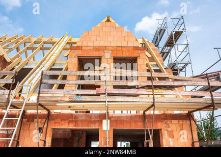 unfinished residential home in construction Stock Photo