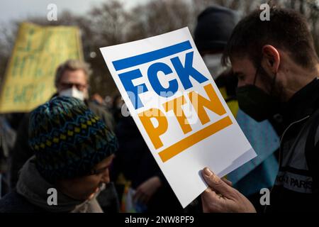 Berlin, Germany, 27-02-2022. People with an FCK PTN anti-war sign take part in a peace rally against the Russian invasion of Ukraine. Stock Photo