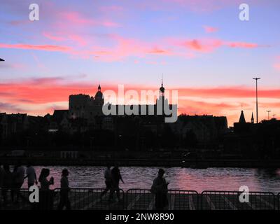 Night senery: Scenic view of river and castle against sky during sunse - Ducal castle and West Oder River Szczecin Poland Stock Photo