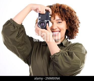 Photographer, portrait and woman using camera for a photoshoot isolated in studio white background. African American, black person and creative Stock Photo