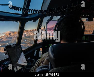 U.S. Air Force Capt. Kyle Buehler, 37th Airlift Squadron pilot, flys a C-130J Super Hercules aircraft over Zaragoza, Spain, during exercise Chasing Sol, Jan. 26, 2023. Members of the 86th Airlift Wing, 435th Air Ground Operations Wing and Soldiers assigned to the 21st Theater Sustainment Command’s 5th Quartermaster Company are in Zaragoza to participate in exercise Chasing Sol with the Spanish air force. Stock Photo