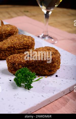 Tasty vegetarian vegan meat free chicken thighs, healthy food close up Stock Photo