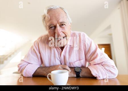 Happy senior caucasian man having video call Stock Photo
