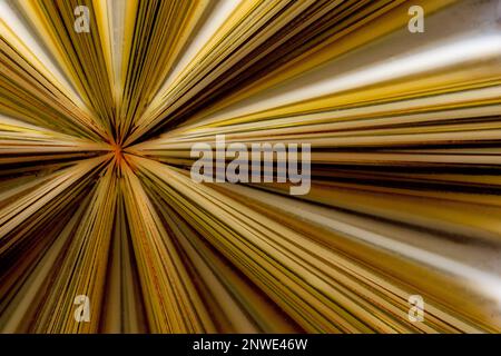 blurred abstract golden shiny background of uneven surface, horizontal Stock Photo
