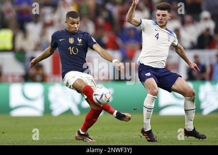 AL KHOR - (LR) Declan Rice of England, Kylian Mbappe of France during ...
