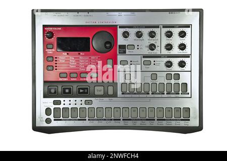 Vintage analog silver and red electronic drum machine sequencer. Flat perspective, isolated on white background Stock Photo