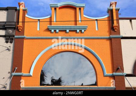 524 Orange-fair blue-brown Art Deco building at The Corso pedestrian mall-Manly suburb. Sydney-Australia. Stock Photo