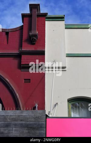 525 Maroon-pale green Art Deco building at The Corso pedestrian mall-Manly suburb. Sydney-Australia. Stock Photo