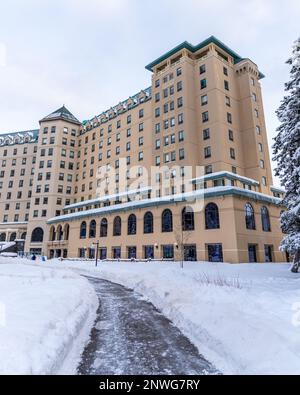 Panoramic view of the Fairmont Chateau Lake Louise in Alberta during winter time. Stock Photo