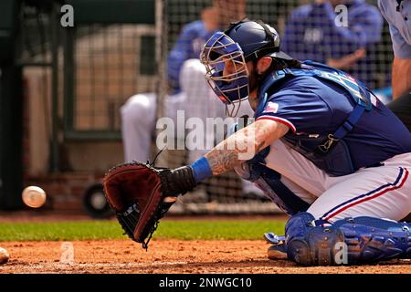 Texas Rangers' Jonah Heim bats during the first inning of a spring training  baseball game against the Colorado Rockies Tuesday, Feb. 28, 2023, in  Surprise, Ariz. (AP Photo/Charlie Riedel Stock Photo - Alamy