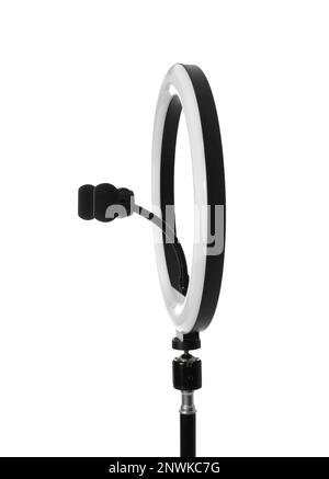 Modern ring light on stand against white background Stock Photo