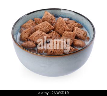 Tasty corn pads with milk in bowl isolated on white Stock Photo