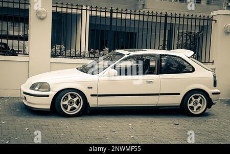 Small white car in Claremont Newlands, Cape Town, South Africa. Stock Photo