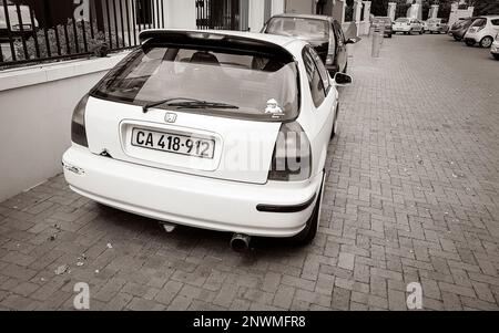 Small white car in Claremont Newlands, Cape Town, South Africa. Stock Photo