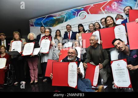 Mexico City, Mexico. 28th Feb, 2023. Guest artists pose with their recognition during the opening of the exhibition Morelos: Art, Land and Freedom in the Motor lobby of the Senate of Mexico Republic. on February 28, 2023 in Mexico City, Mexico. (Credit Image: © Carlos Tischler/eyepix via ZUMA Press Wire) EDITORIAL USAGE ONLY! Not for Commercial USAGE! Stock Photo