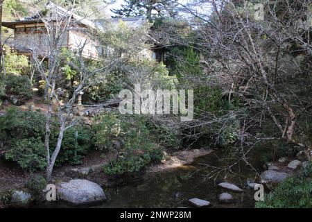 The garden of a traditional Japanese hotel in Miyajima, Hiroshima, Japan Stock Photo