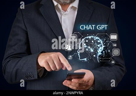 Artificial Intelligence in Bot Chat. Businessman using Ai chatbot in his smartphone. Stock Photo