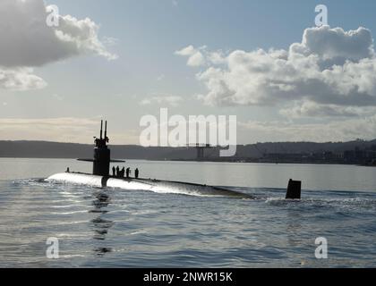 230210-N-ED185-1261  PUGET SOUND, Wash. (Feb. 10, 2023) The Los Angeles-class fast-attack submarine USS Key West (SSN 722) transits the Puget Sound before mooring at Naval Base Kitsap – Bremerton, Washington, February 10, 2023. Measuring more than 360 feet long and weighing more than 6,900 tons when submerged, Key West supports a multitude of missions to include anti-submarine warfare, anti-surface ship warfare, surveillance and reconnaissance, and strike warfare. Stock Photo
