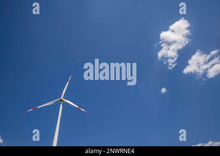 Wind turbine, blue sky with cloud, Energy Mountain, Karlsruhe, Baden-Wuerttemberg, Germany Stock Photo