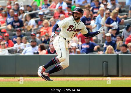 ATLANTA, GA - AUGUST 19: Atlanta Braves All-Star right fielder Nick Markakis  (22) stands on third base during the MLB game between the Atlanta Braves  and the Colorado Rockies on August 19