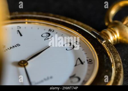 Summer time, winter time, symbolic photo of a pocket watch for the time change, studio shot, Germany Stock Photo