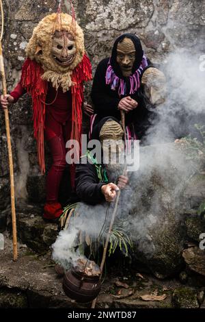 Montalegre, Portugal. 19th Feb, 2023. Caretos of Misarela are seen posing during the celebrations of Carnival Entrudo of Misarela. Entrudo da Misarela is a socio-cultural dynamization project that aims to bring the two banks of Rabagão closer together, around the same idea: to recreate Entrudo as a celebration of the 'entrance' of Spring. The event happens in the Misarela bridge, a bridge that was built in the middle ages, located in Montalegre in the North East of Portugal. Credit: SOPA Images Limited/Alamy Live News Stock Photo