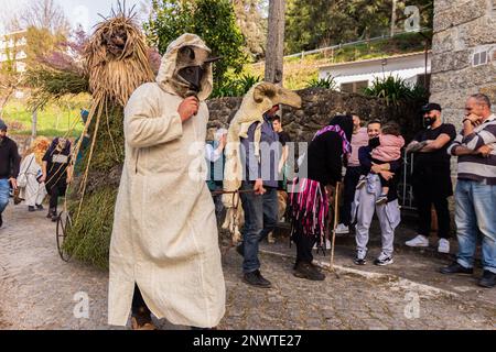 Montalegre, Portugal. 19th Feb, 2023. Misarela Caretos parade during the Carnival Entrudo of Misarela, Montalegre, Portugal. Entrudo da Misarela is a socio-cultural dynamization project that aims to bring the two banks of Rabagão closer together, around the same idea: to recreate Entrudo as a celebration of the 'entrance' of Spring. The event happens in the Misarela bridge, a bridge that was built in the middle ages, located in Montalegre in the North East of Portugal. Credit: SOPA Images Limited/Alamy Live News Stock Photo