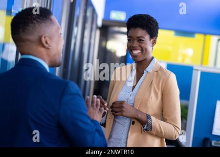 Diverse business people discussing work at office. Working at office, business, finances and corporation concept. Stock Photo