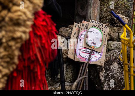 Montalegre, Misarela, Portugal. 19th Feb, 2023. Posters that say ''No To Mines'' are seen during a small demonstration of Misarela Caretos against the lithium mines that are harming the entire ecosystem of Montalegre. Entrudo da Misarela is a socio-cultural dynamization project that aims to bring the two banks of RabagÃ£o closer together, around the same idea: to recreate Entrudo as a celebration of the 'entrance' of Spring. The event happens in the Misarela bridge, a bridge that was built in the middle ages, located in Montalegre in the North East of Portugal. (Credit Image: © Telmo Pinto/ Stock Photo