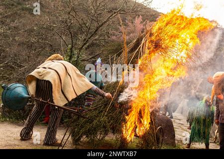 Montalegre, Misarela, Portugal. 19th Feb, 2023. Careto of Misarela is seen to set fire to Entrudo. This is the last ritual of the celebrations of Carnival Entrudo of Misarela. Entrudo da Misarela is a socio-cultural dynamization project that aims to bring the two banks of RabagÃ£o closer together, around the same idea: to recreate Entrudo as a celebration of the 'entrance' of Spring. The event happens in the Misarela bridge, a bridge that was built in the middle ages, located in Montalegre in the North East of Portugal. (Credit Image: © Telmo Pinto/SOPA Images via ZUMA Press Wire) EDITORIAL Stock Photo