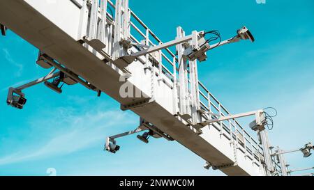 Close-up Of Security Camera On The Street. Multi-angle CCTV on pillar 360 degree system background blast cipping path operating over the road monitoring system of blue sky. Technology concept Stock Photo