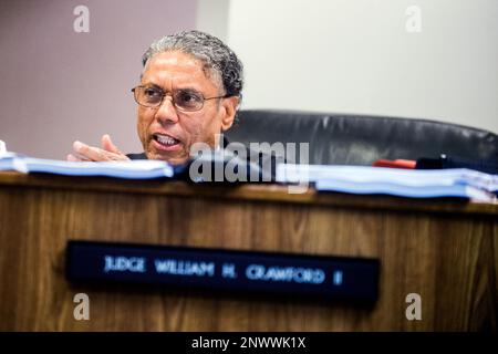https://l450v.alamy.com/450v/2nwwk1x/genesee-district-judge-william-h-crawford-ii-asks-questions-as-defense-attorney-jerold-lax-delivers-his-closing-arguments-during-the-preliminary-examination-of-dr-eden-wells-on-monday-aug-6-2018-at-genesee-county-district-court-in-flint-mich-wells-is-michigans-chief-medical-executive-jake-maythe-flint-journal-via-ap-2nwwk1x.jpg