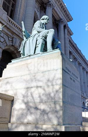 The 1911 bronze statue of a seated Thomas Jefferson by Karl Bitter outside the Cuyahoga County Courthouse in downtown Cleveland, Ohio, USA. Stock Photo