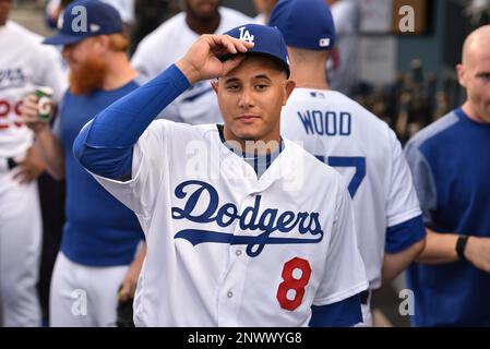 Milwaukee, WI, USA. 20th July, 2018. Los Angeles Dodgers shortstop Manny  Machado #8 is all smiles as he joins his new team just after the All-Star  break. Machado is seen here during