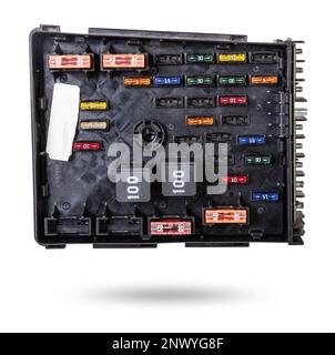 Automotive fuses on a white panel with holders and multi-colored markings - a protective device that opens the electrical circuit when the rated curre Stock Photo