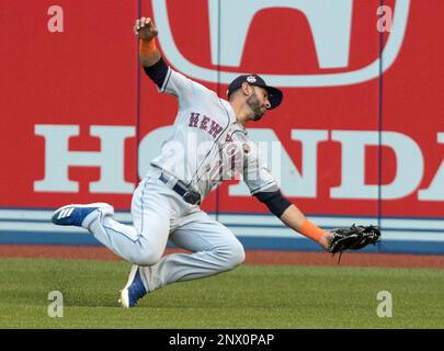 American League All-Stars Jose Bautista reacts with Miguel Cabrera after  Cabrera scored a run in the fourth inning at the 84th MLB All-Star Game at  Citi Field in New York City on