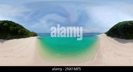 360VR: Sandy beach and turquoise water in the tropical resort of Boracay, Puka beach, Philippines aerial view. White beach with tourists. Summer and travel vacation concept. Stock Photo