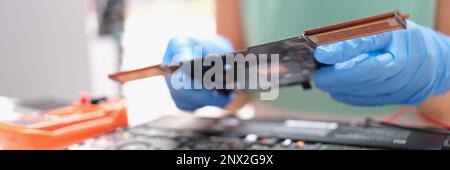 Technical engineer is working on computer motherboard Stock Photo
