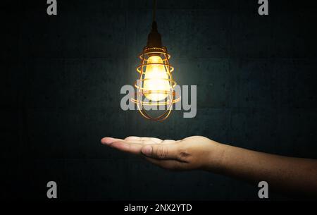 Light Bulbs on dark background. Creative idea concept Stock Photo