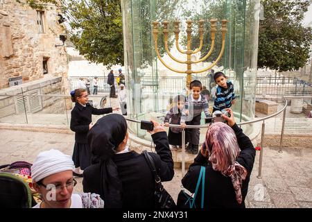 women and children,The Golden Menorah, Jewish Quarter, Old City, Jerusalem, Israel Stock Photo