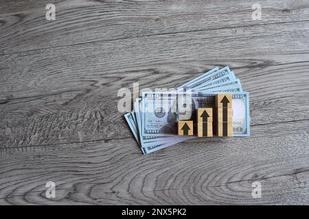 Top view image of money and upward arrows. Business, profit increase and economic growth concept Stock Photo