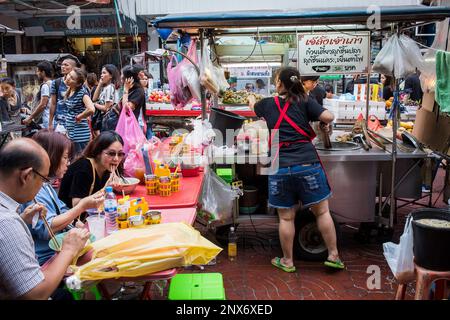 Noodle stand, Street food market, at Itsara nuphap, Chinatown, Bangkok, Thailand Stock Photo