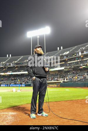 Former Oakland Athletics pitcher Dallas Braden wears a jersey of former San  Francisco Giants pitcher Tim Lincecum before a baseball game between the  Athletics and the Giants in Oakland, Calif., Friday, Aug.