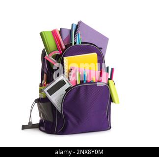 Purple backpack with different school supplies isolated on white Stock Photo