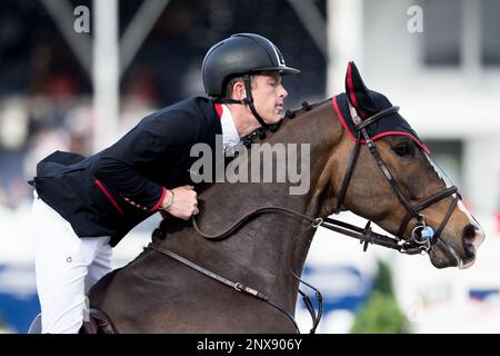 An equestrian competes in the 1.50 1.55m Table A Against the Clock