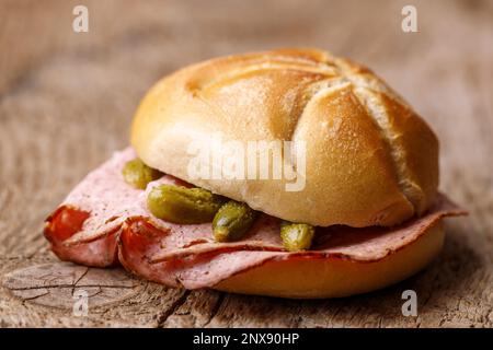 Bavarian Liver Cheese Sandwich On Dark Wood Stock Photo
