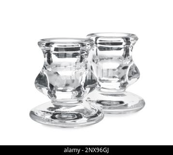 Small modern glass candlesticks on white background Stock Photo