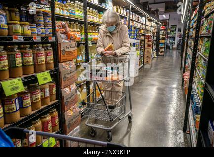 Elderly woman shops in a supermarket in New York on Thursday, February 16, 2023. Despite the 8.7% Social Security COLA and the trend downward of inflation many senior citizens are concerned over rising costs. (© Richard B. Levine) Stock Photo